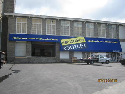 striped awnings outside of commercial building