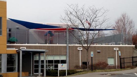 striped awnings outside of commercial building