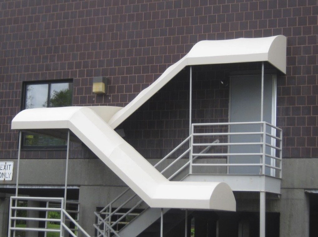 striped awnings outside of commercial building
